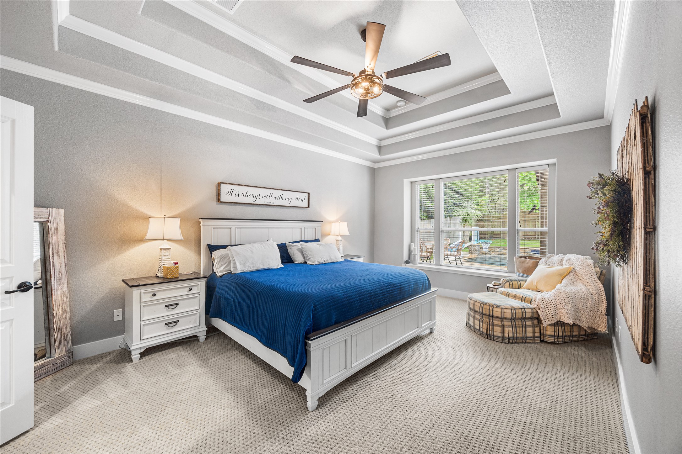 2167 Summit Mist Drive Conroe, TX 77304 - Photo 18 of 34 a spacious bedroom with a bed and a window