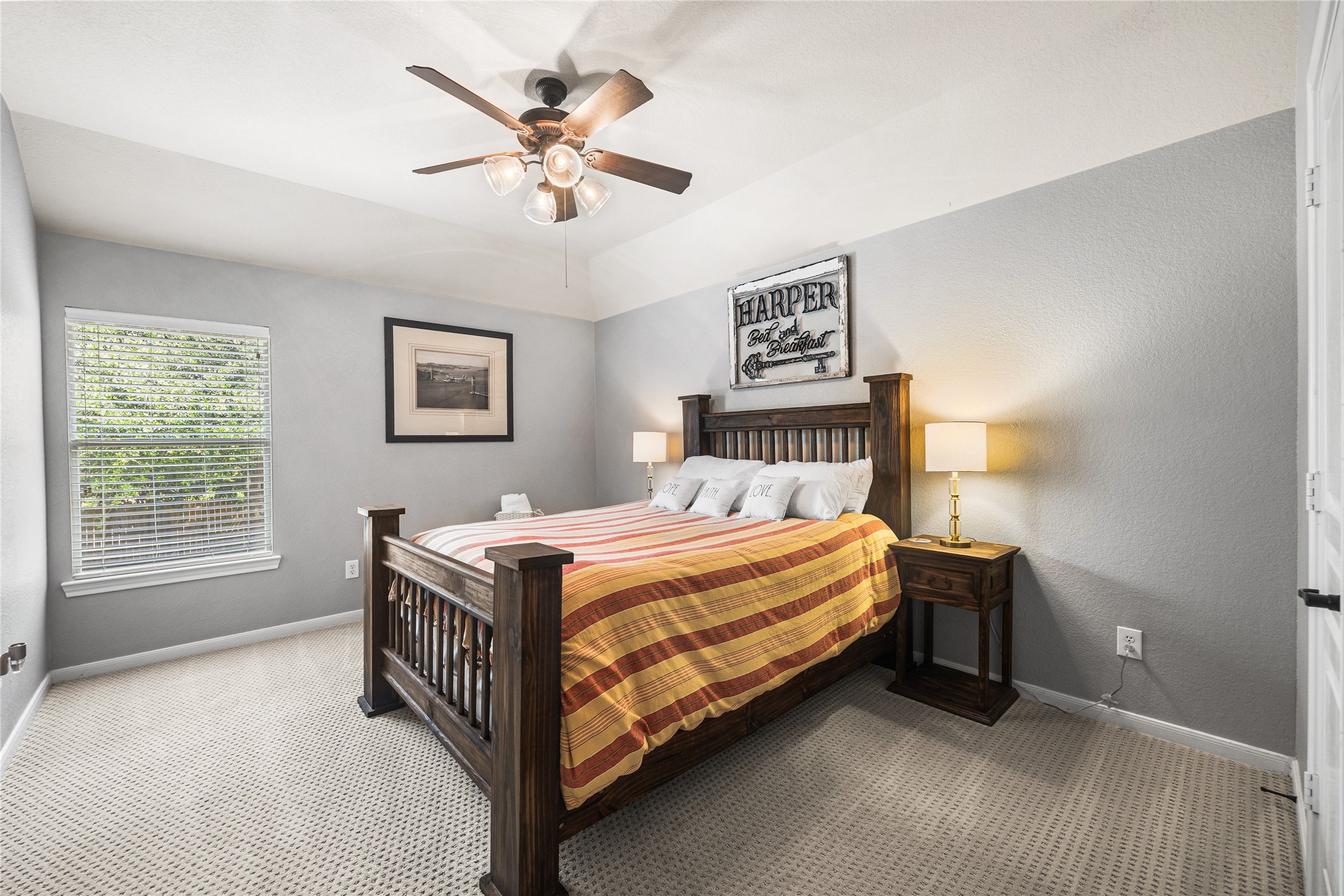 2167 Summit Mist Drive Conroe, TX 77304 - Photo 26 of 34 a bedroom with a bed and a window