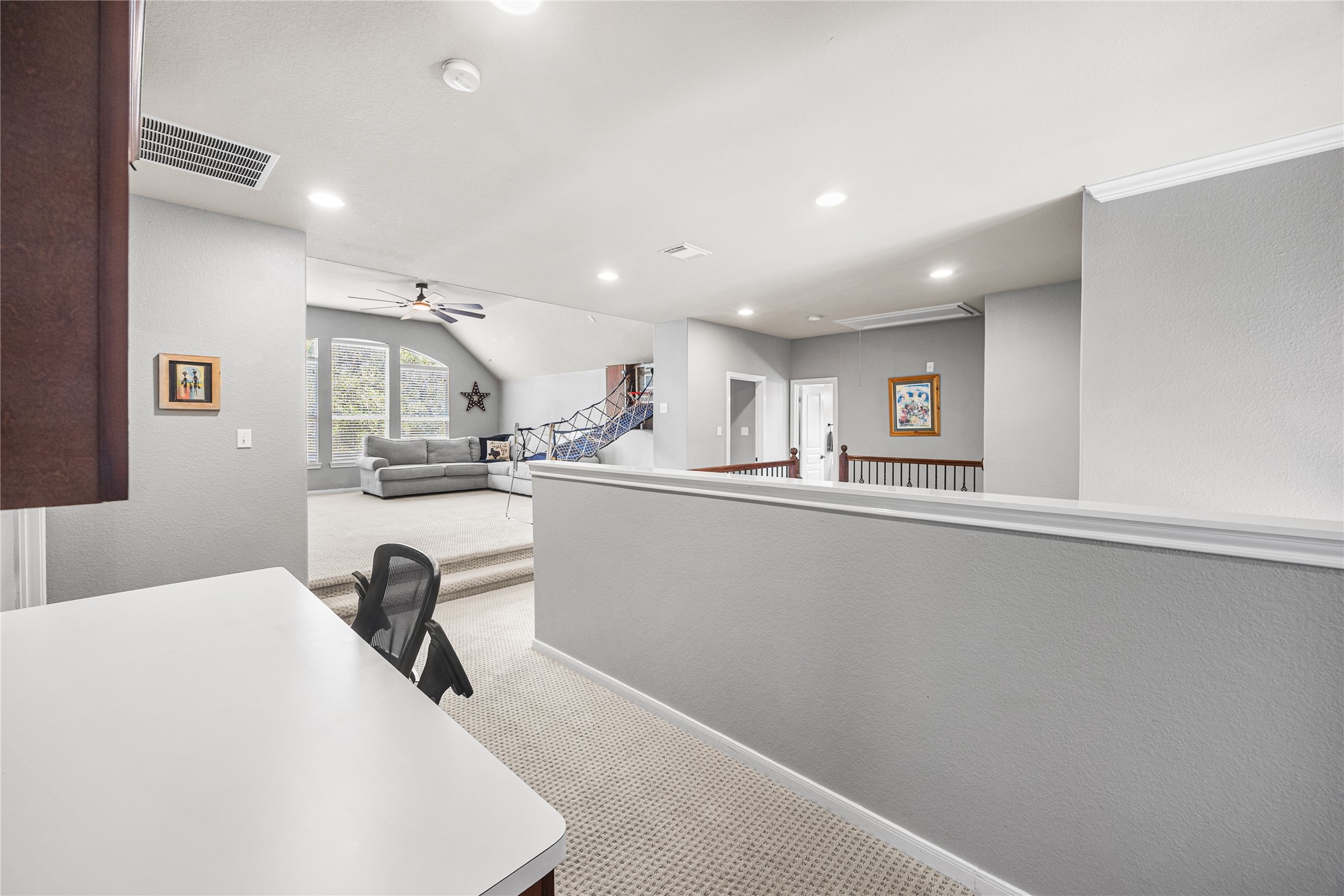 2167 Summit Mist Drive Conroe, TX 77304 - Photo 29 of 34 a living room with stainless steel appliances furniture a kitchen view and a window
