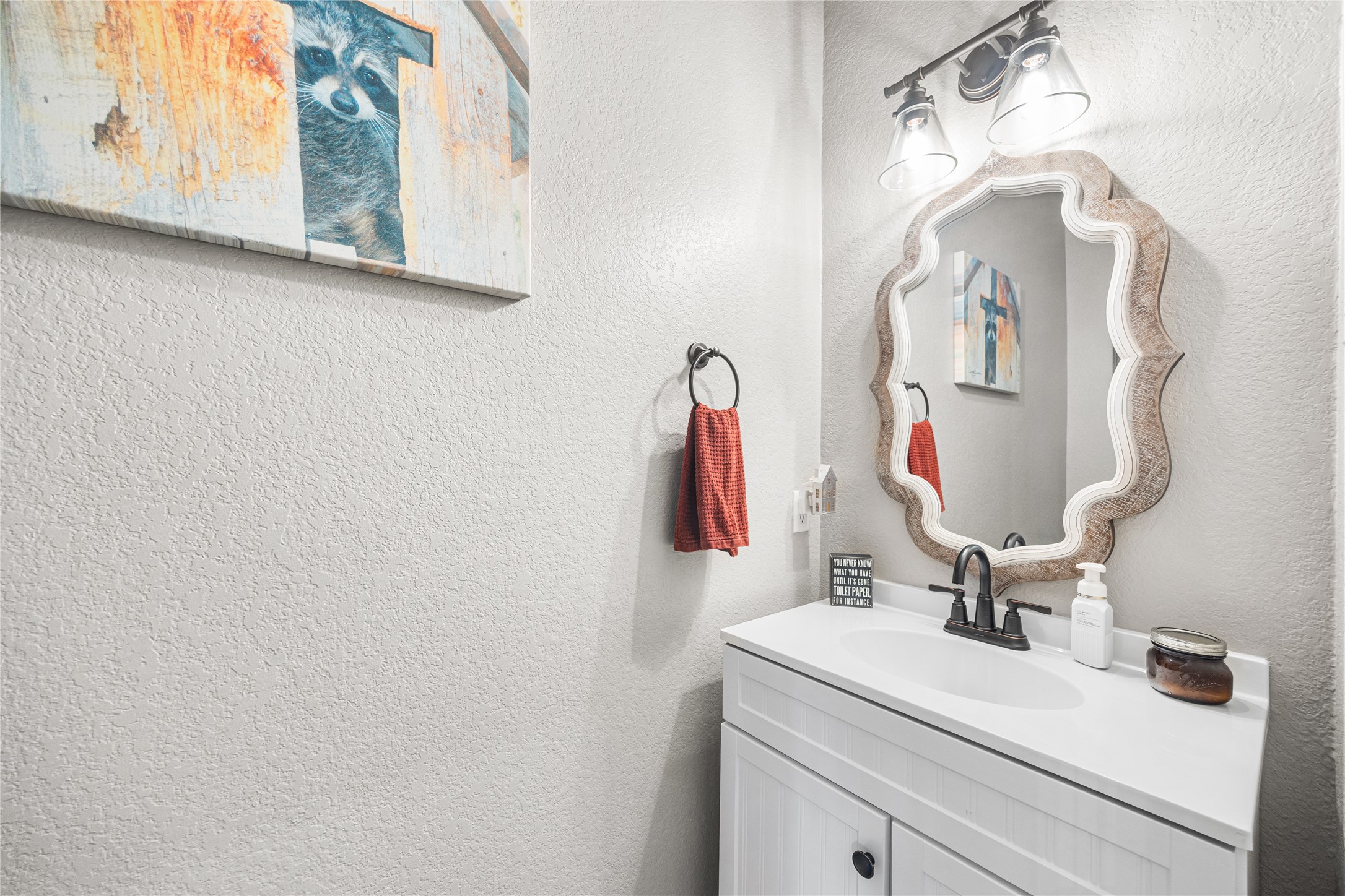 2167 Summit Mist Drive Conroe, TX 77304 - Photo 30 of 34 a bathroom with a sink and a mirror