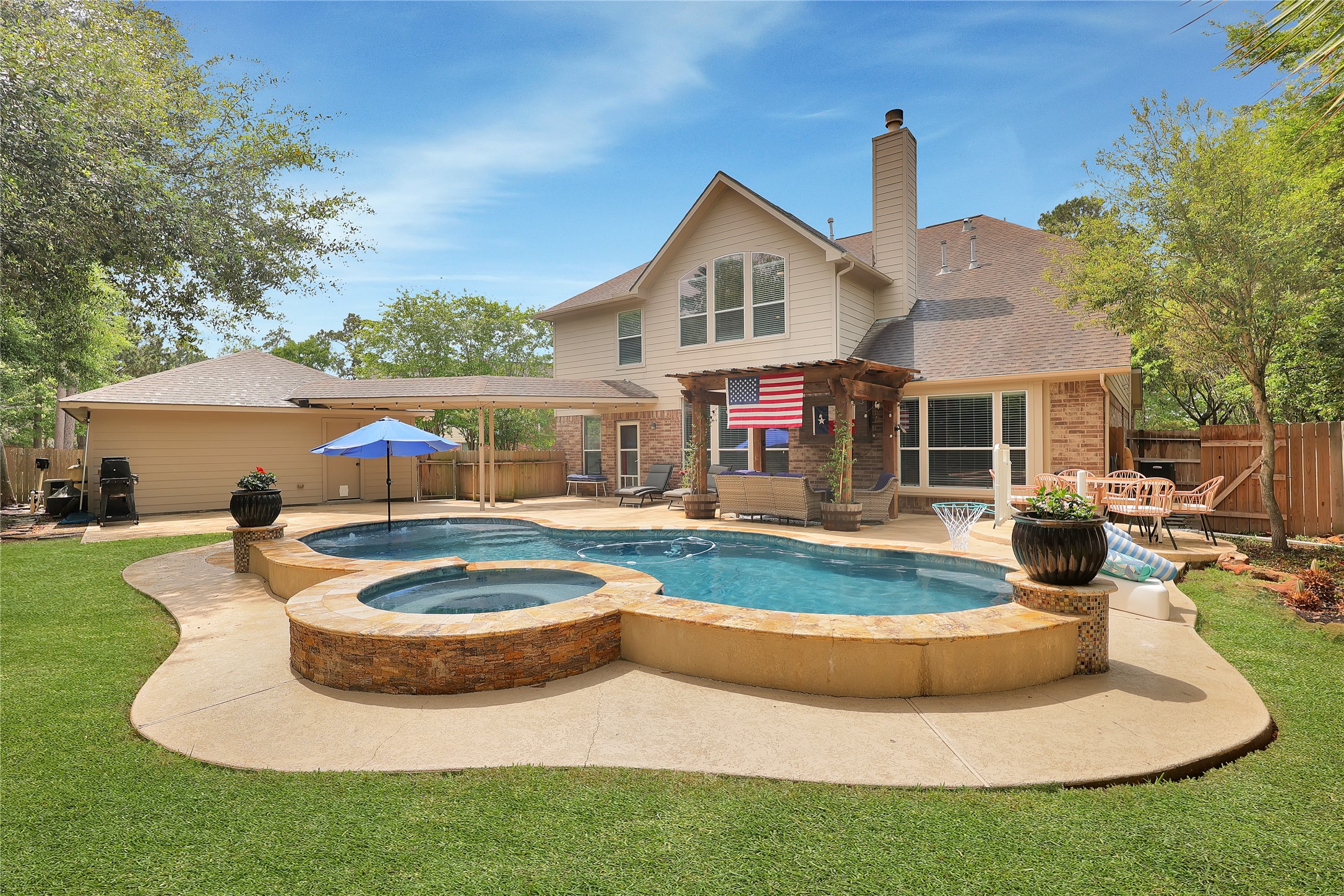 2167 Summit Mist Drive Conroe, TX 77304 - Photo 4 of 34 a view of a house with swimming pool