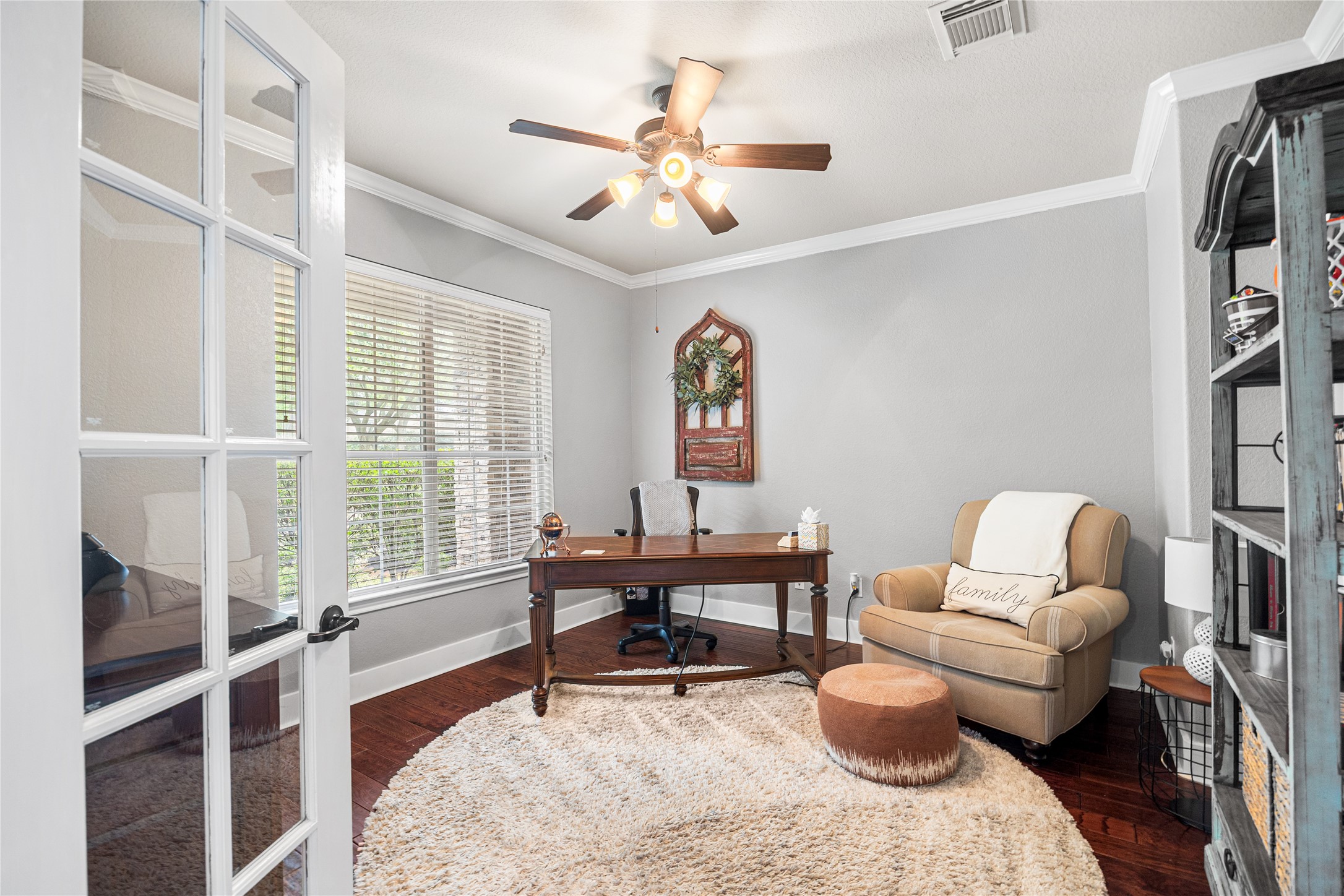 2167 Summit Mist Drive Conroe, TX 77304 - Photo 6 of 34 a living room with furniture and a large window