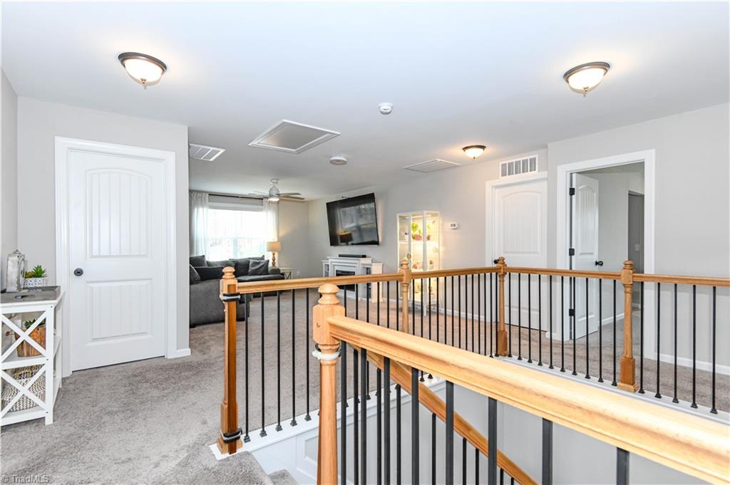 7729 Carson Path Summerfield, NC 27358 - Photo 23 of 48 Loft Area at top of stairs