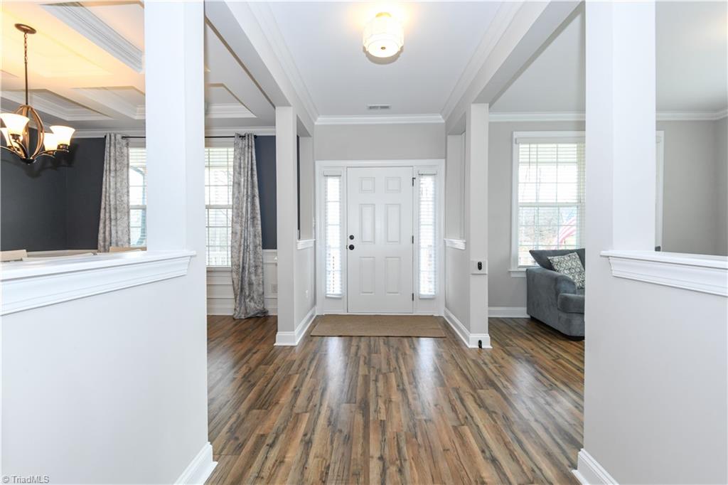 7729 Carson Path Summerfield, NC 27358 - Photo 3 of 48 Gorgeous entry way. Formal dining on left, playroom/living room on right