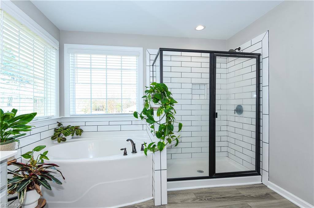 7729 Carson Path Summerfield, NC 27358 - Photo 33 of 48 Soak away in your tub in your primary bath