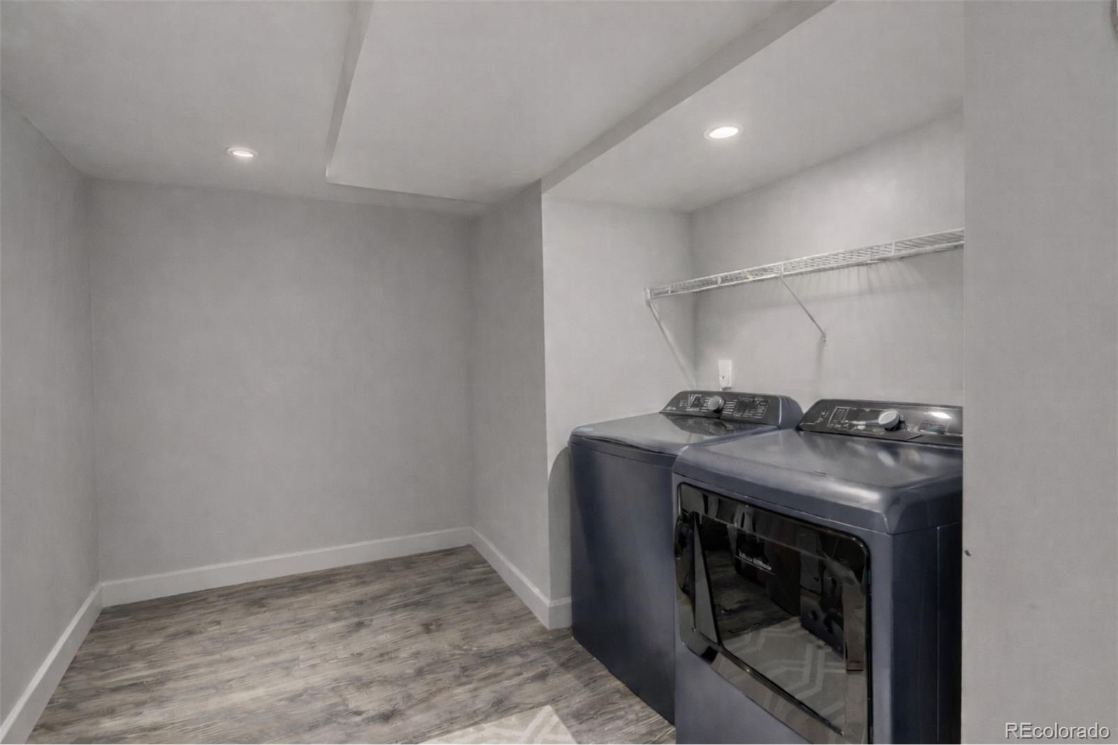 3650 Oneida Street Denver, CO 80207 - Photo 20 of 31 a utility room with dryer and washer
