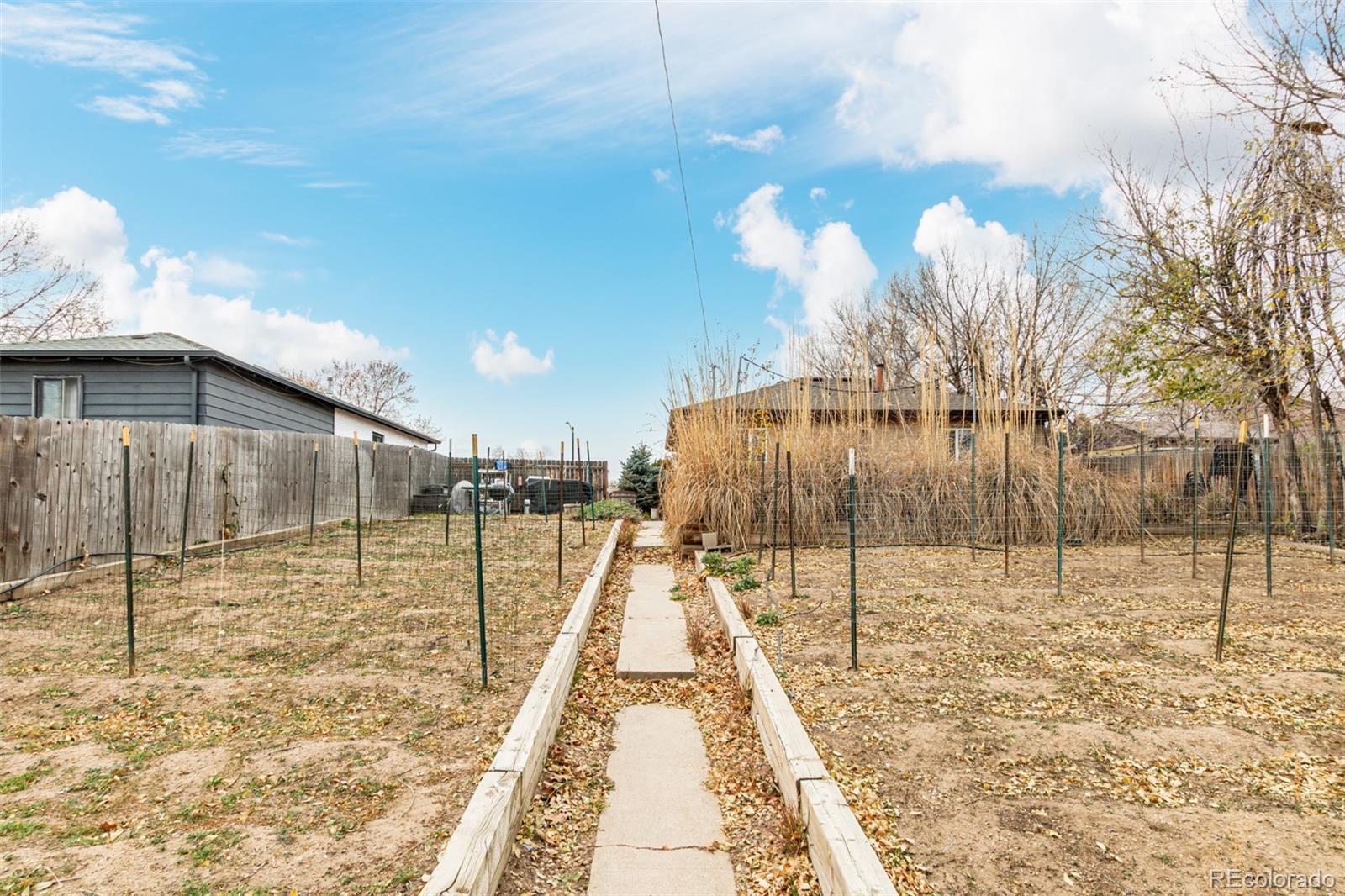 3650 Oneida Street Denver, CO 80207 - Photo 26 of 31 a view of a backyard
