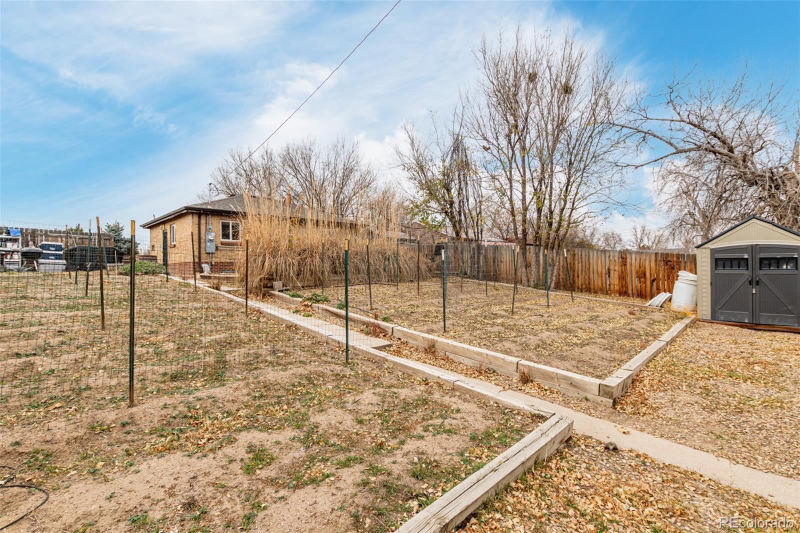 3650 Oneida Street Denver, CO 80207 - Photo 27 of 28 a view of a backyard