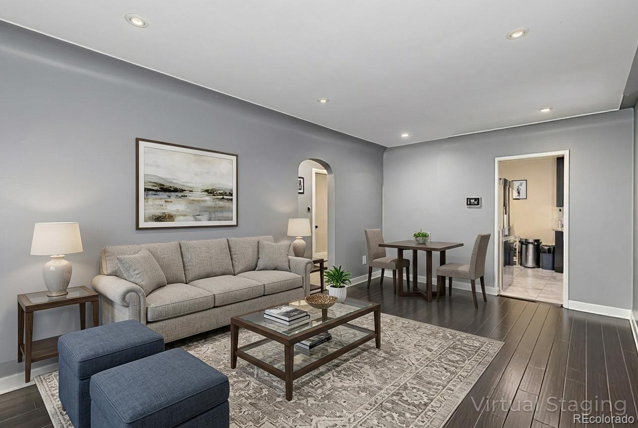 3650 Oneida Street Denver, CO 80207 - Photo 5 of 31 a living room with furniture wooden floor and a table