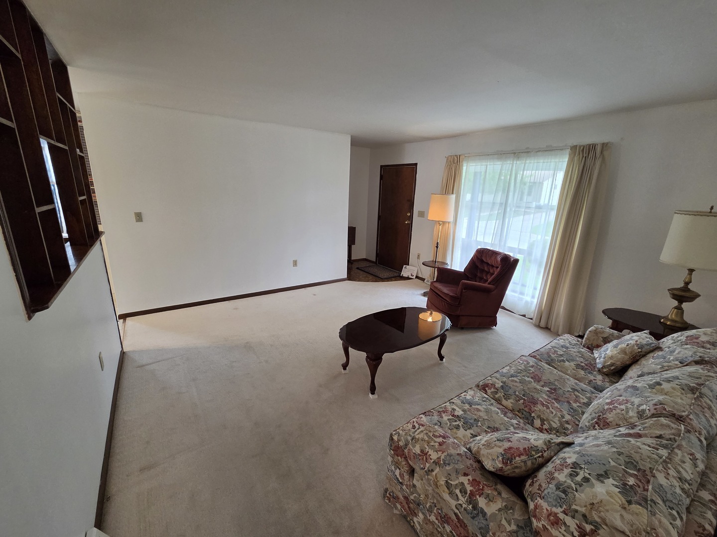 1105 6th Street West Milan, IL 61264 - Photo 11 of 23 a living room with furniture and a large window