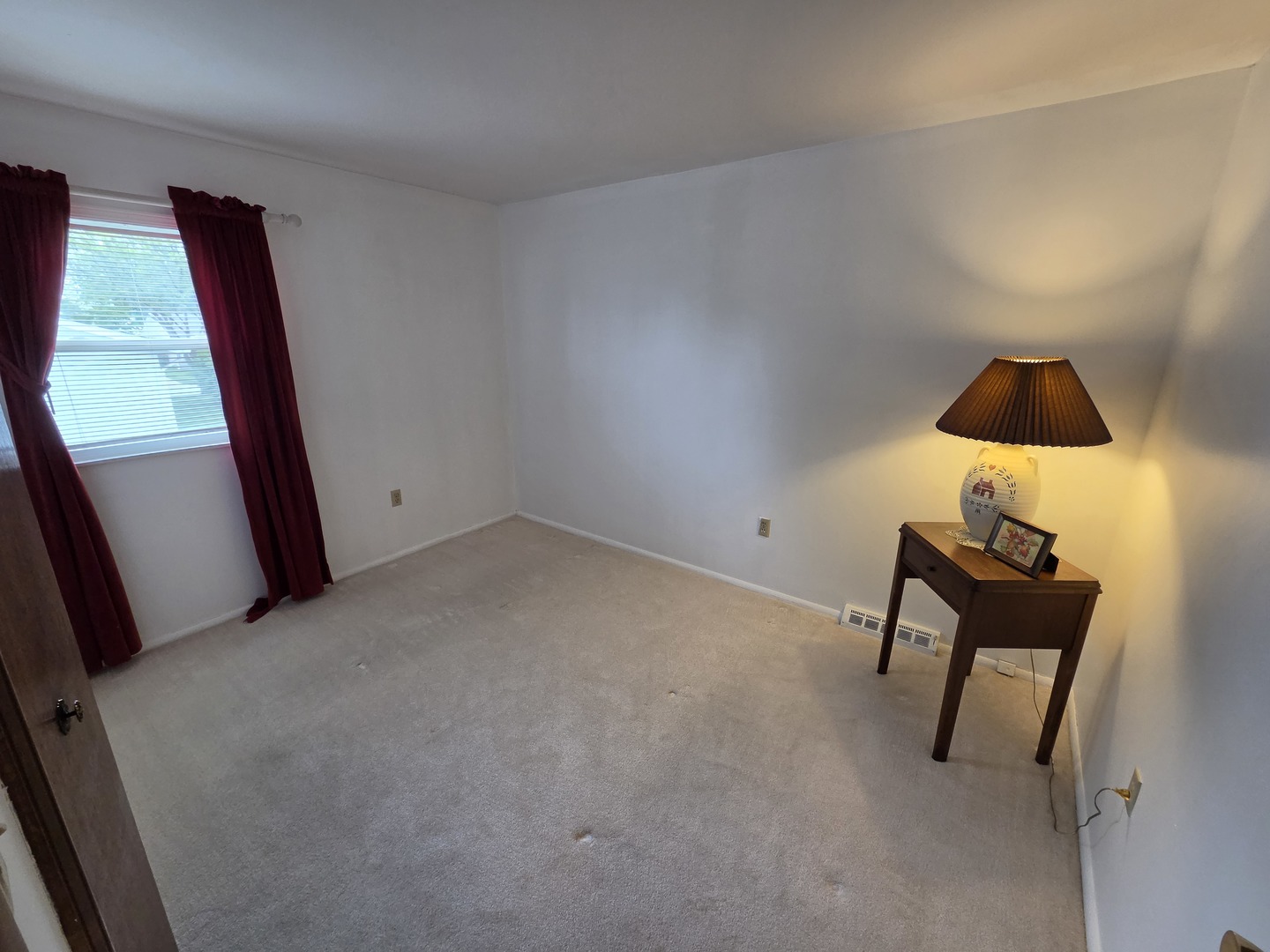 1105 6th Street West Milan, IL 61264 - Photo 14 of 23 a view of a room with a window