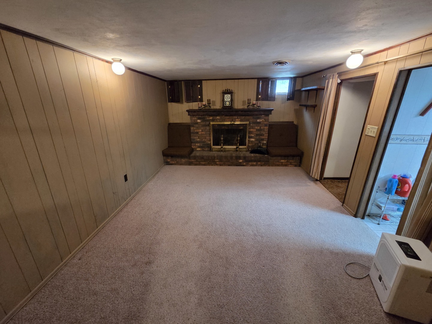1105 6th Street West Milan, IL 61264 - Photo 20 of 23 a view of a livingroom with furniture and a fireplace