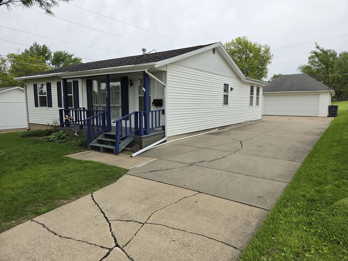 1105 6th Street West Milan, IL 61264 - Photo 2 of 23 a view of backyard with deck and garden