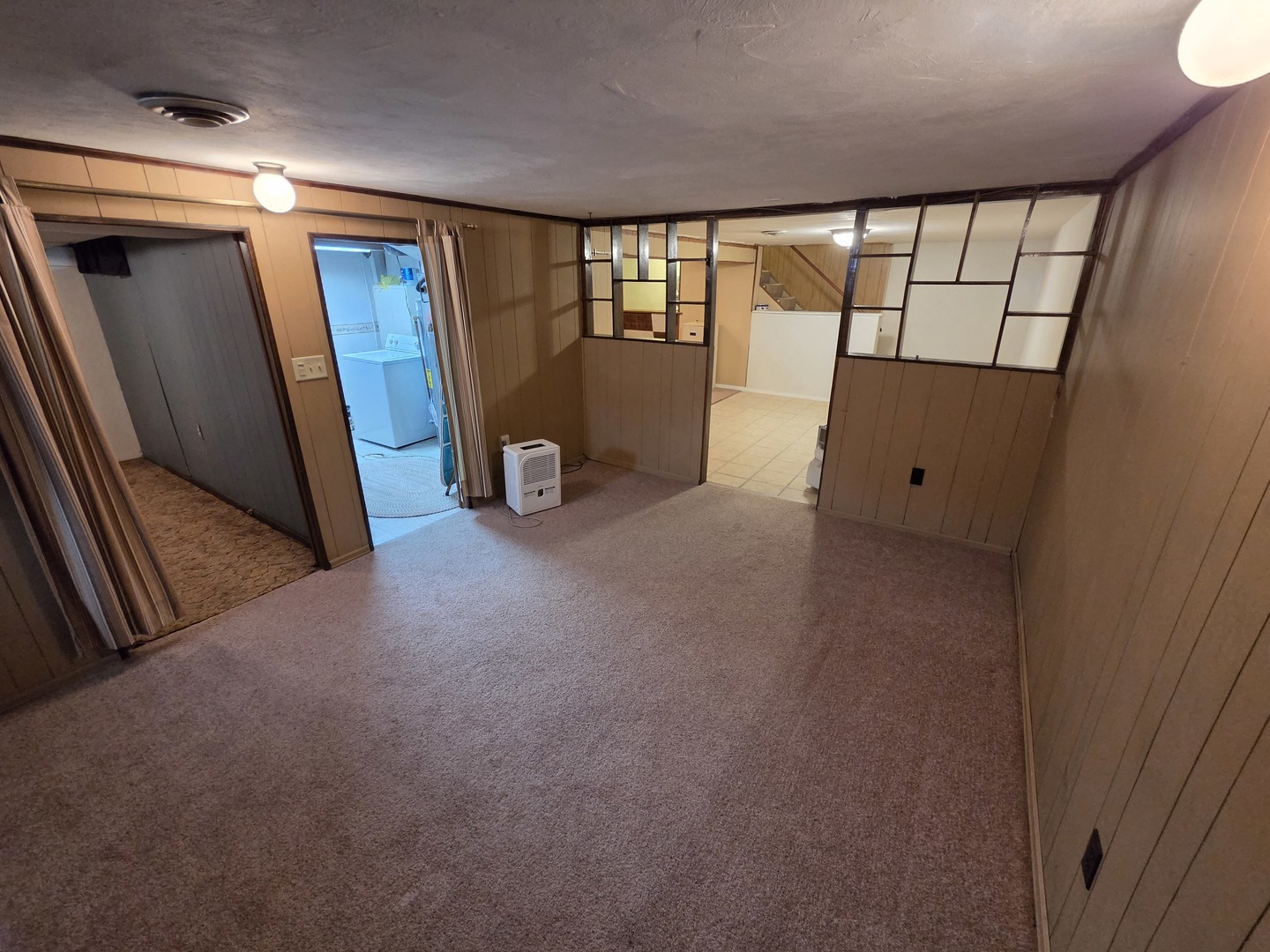 1105 6th Street West Milan, IL 61264 - Photo 21 of 23 a view of an empty room with a window