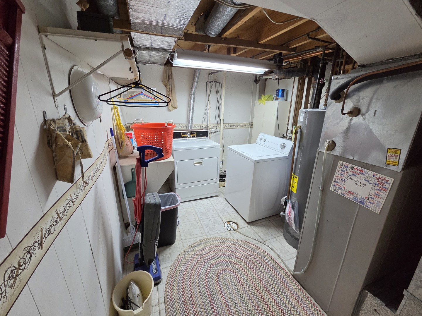 1105 6th Street West Milan, IL 61264 - Photo 23 of 23 a view of walk in closet with clothes and shoes