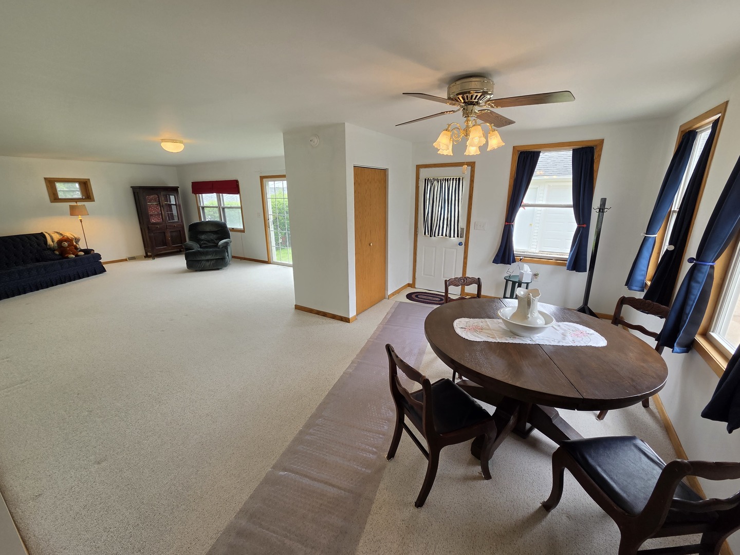1105 6th Street West Milan, IL 61264 - Photo 5 of 23 a view of a a dining room with furniture and a mirror