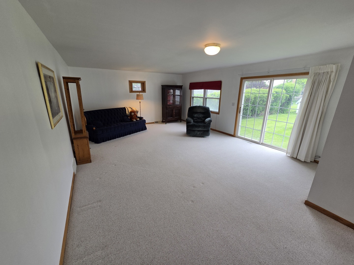 1105 6th Street West Milan, IL 61264 - Photo 6 of 23 a view of livingroom with furniture and staircase