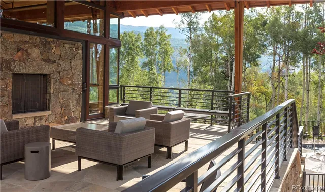 a view of a house with outdoor space and sitting around