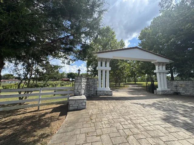 a view of a yard with an outdoor space