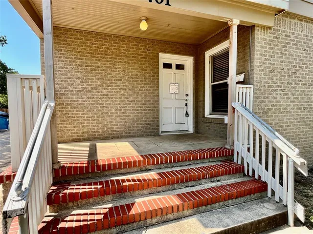 a view of a balcony with door
