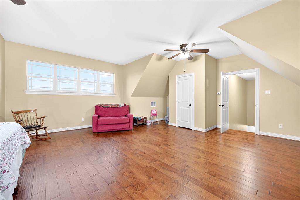 1399 Canyon Lake Road Wills Point, TX 75169 - Photo 26 of 37 an empty room with windows and fan