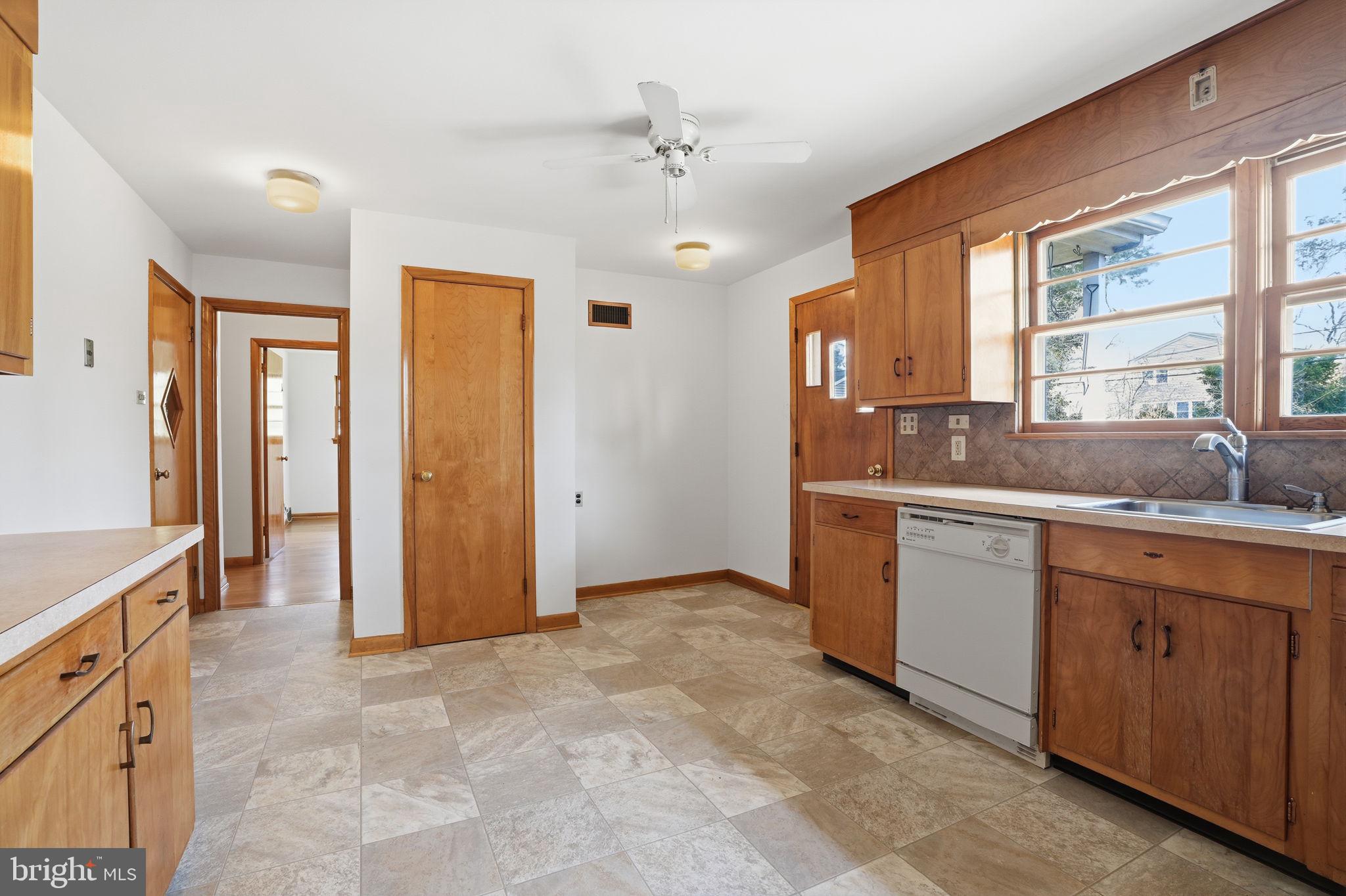 10 Home Road Hatboro, PA 19040 - Photo 11 of 42 a view of a kitchen with a sink and a window