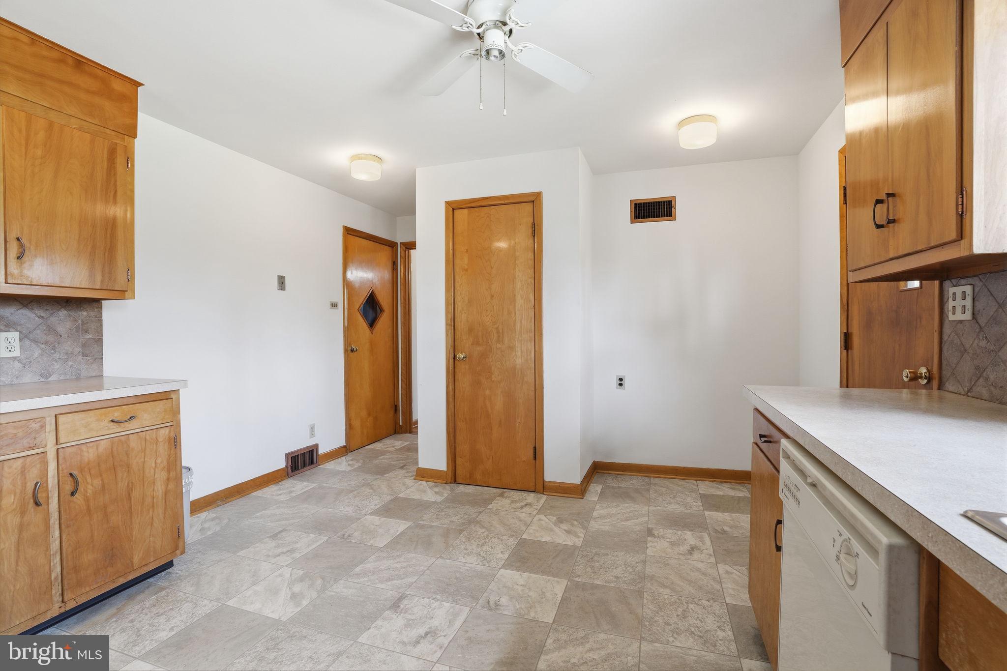 10 Home Road Hatboro, PA 19040 - Photo 12 of 42 a view of a kitchen with a sink and cabinets