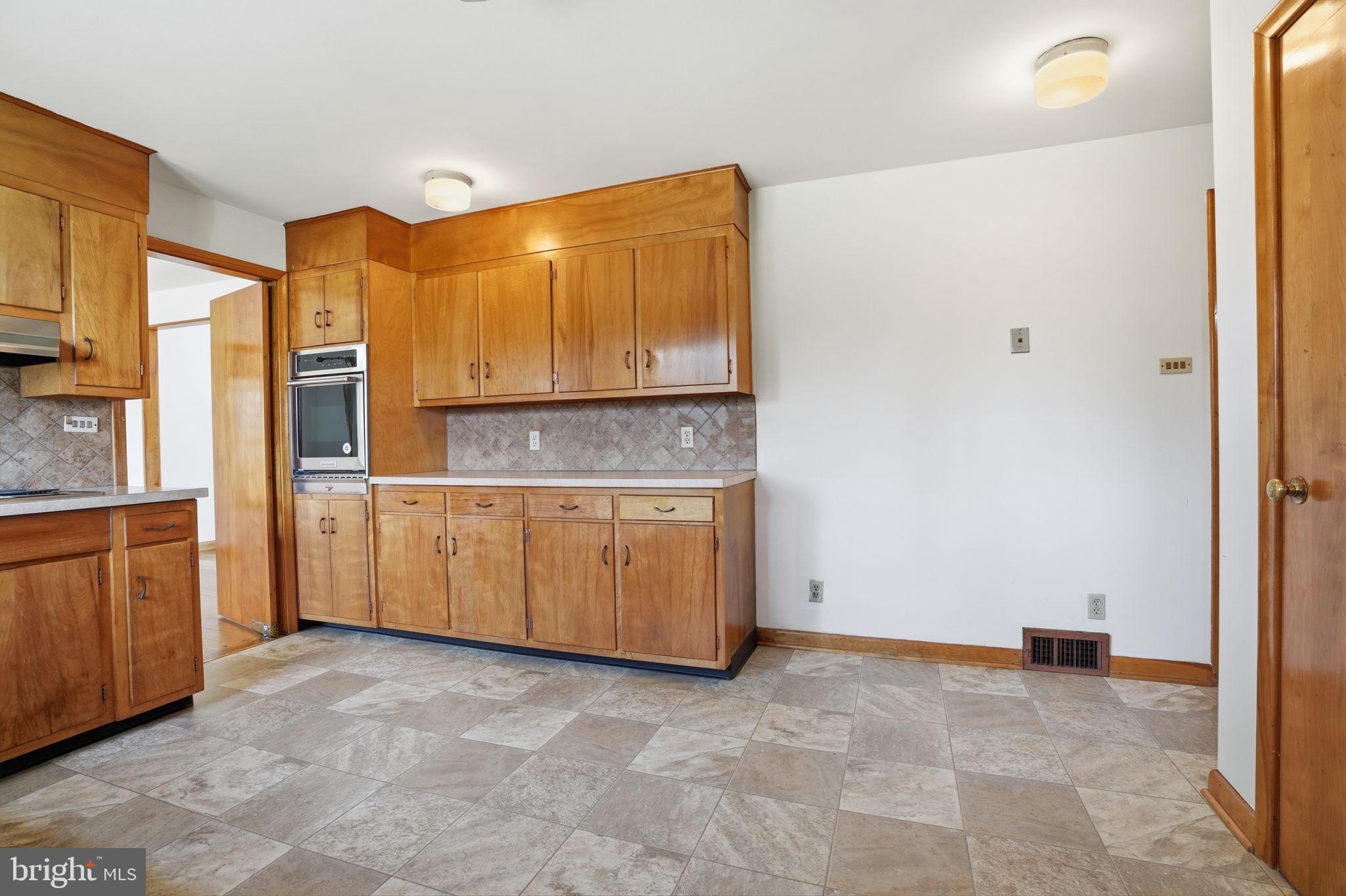 10 Home Road Hatboro, PA 19040 - Photo 15 of 42 a view of a kitchen with refrigerator and cabinet