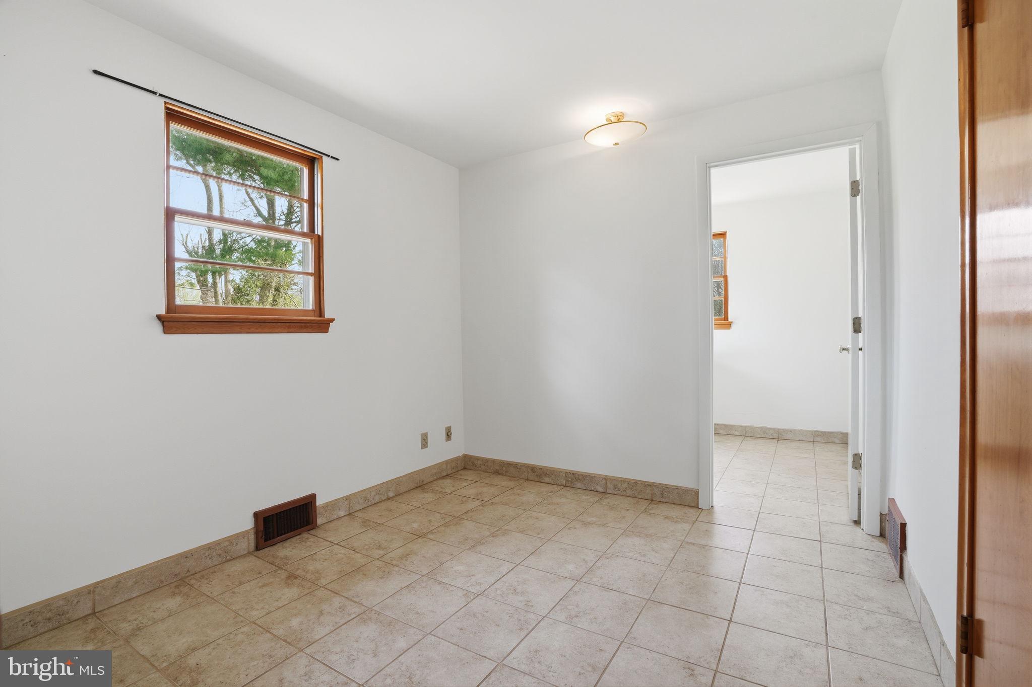 10 Home Road Hatboro, PA 19040 - Photo 16 of 42 an empty room with windows
