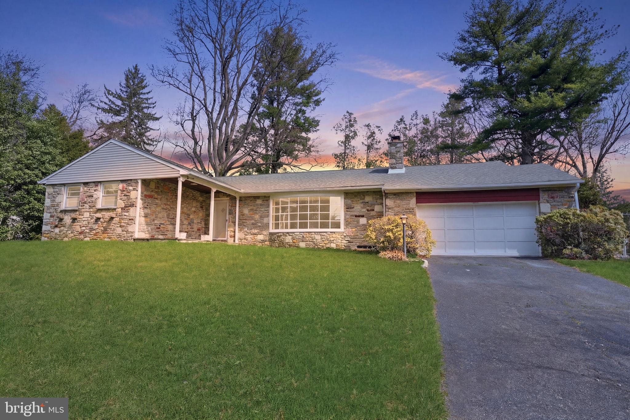 10 Home Road Hatboro, PA 19040 - Photo 2 of 42 a front view of a house with a garden