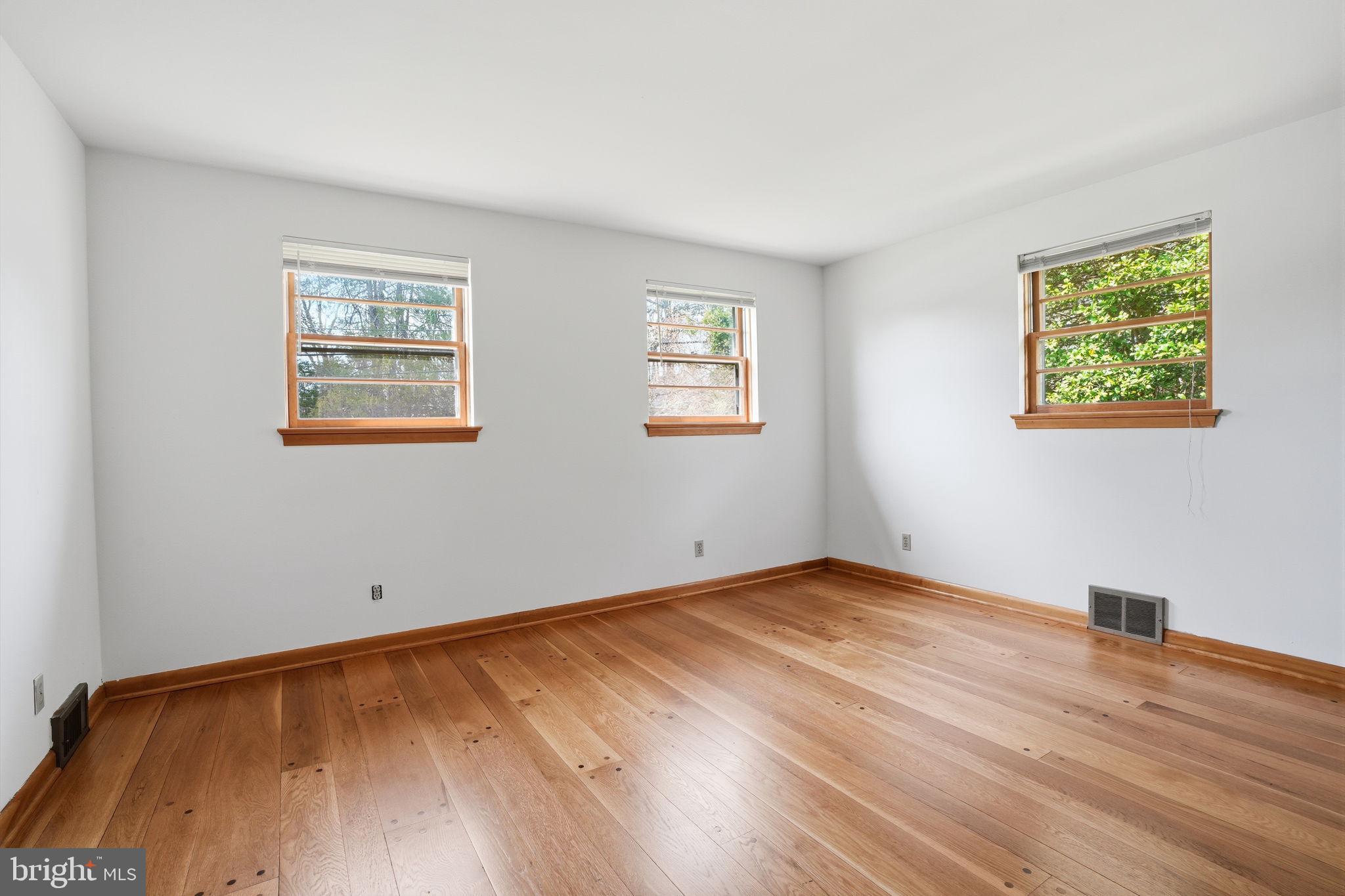 10 Home Road Hatboro, PA 19040 - Photo 24 of 42 a view of an empty room with wooden floor and a window