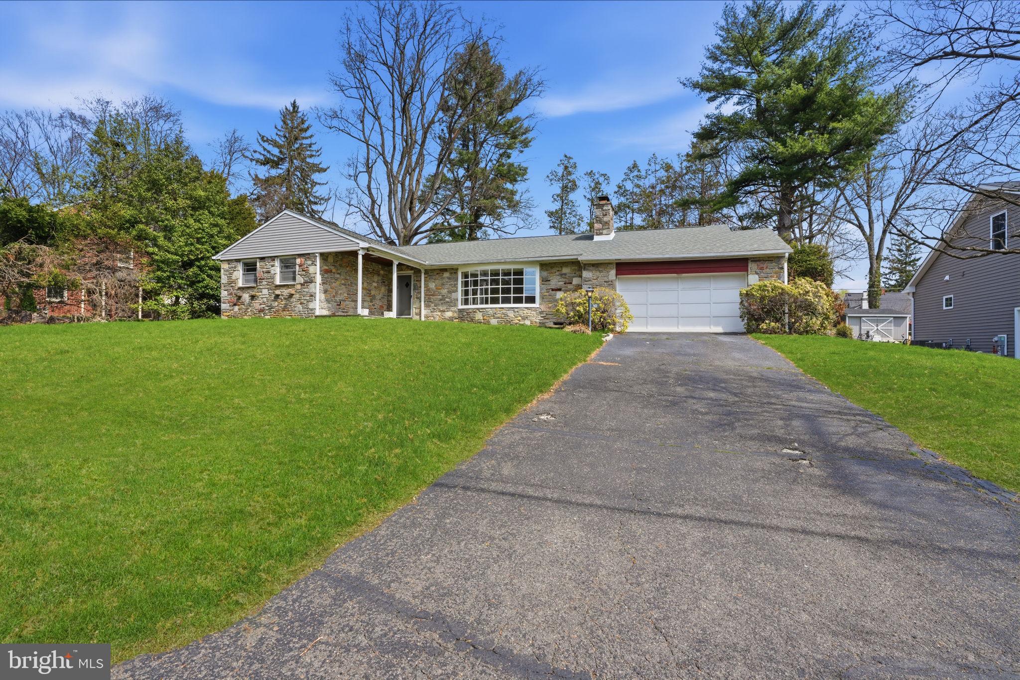 10 Home Road Hatboro, PA 19040 - Photo 3 of 42 front view of a house with a yard