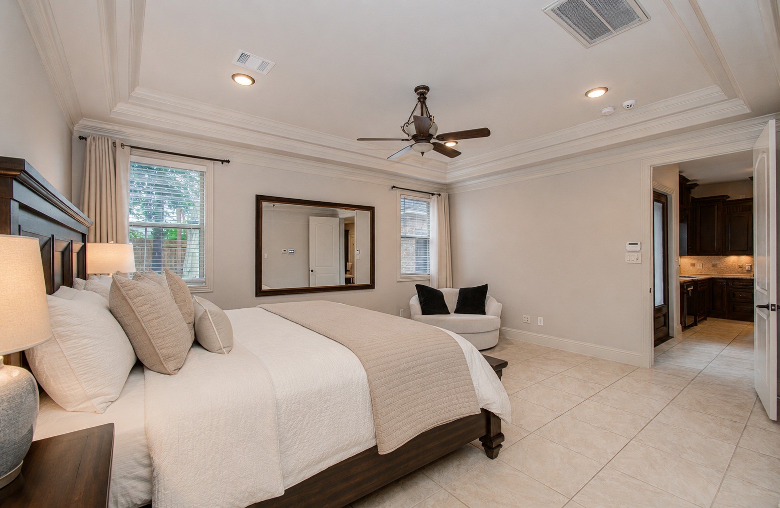 2920 Payson Street Houston, TX 77021 - Photo 21 of 50 a bedroom with a large bed and a chandelier