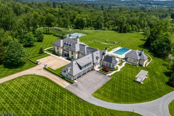 an aerial view of a house with a garden