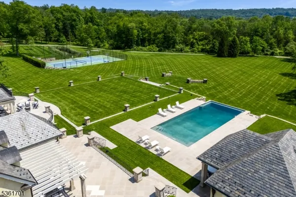 an aerial view of a golf course with a garden
