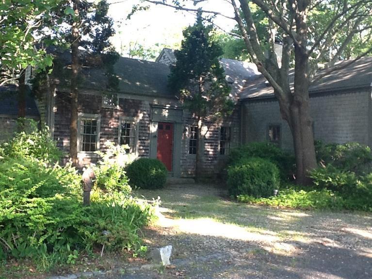 80 Old Dam Road Bourne, MA 02532 - Photo 1 of 31 a view of a yard with plants and trees
