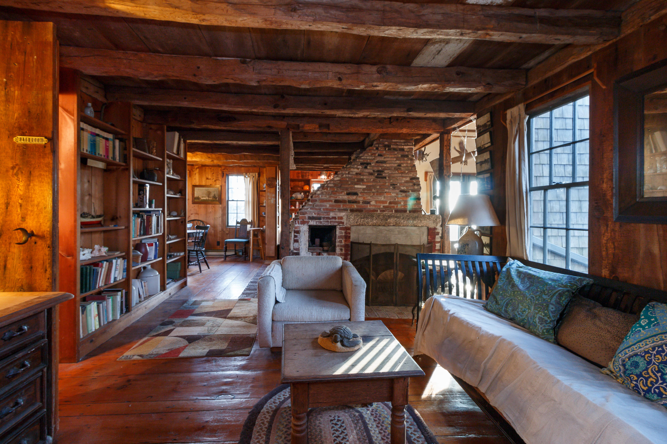 80 Old Dam Road Bourne, MA 02532 - Photo 4 of 31 a living room with furniture and a fireplace