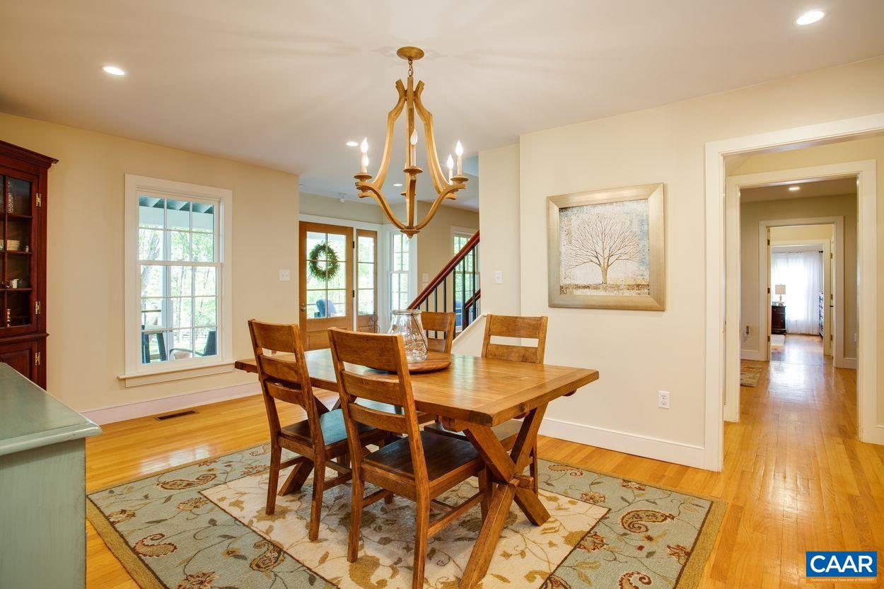 3923 Free Union Road Charlottesville, VA 22901 - Photo 13 of 52 a view of a dining room with furniture and a window