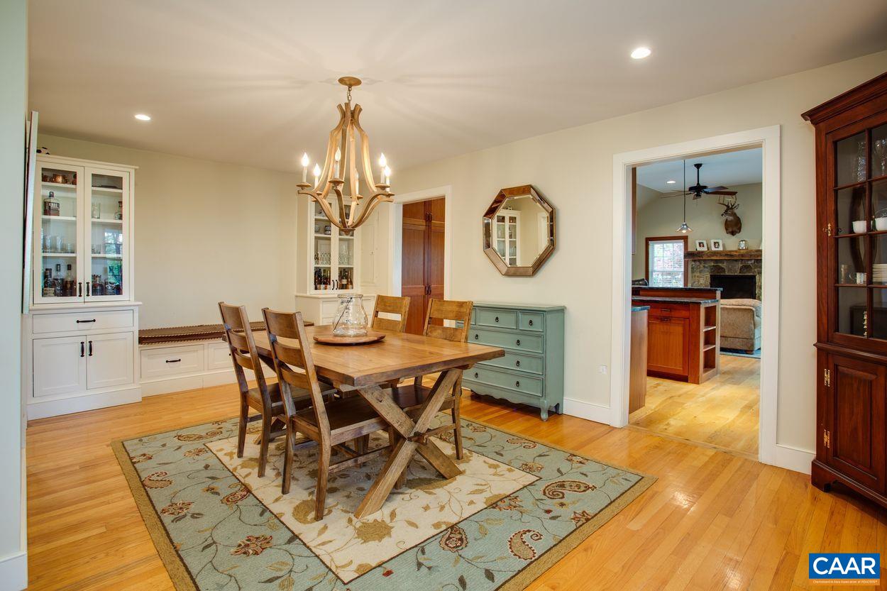 3923 Free Union Road Charlottesville, VA 22901 - Photo 14 of 52 a view of a dining room with furniture