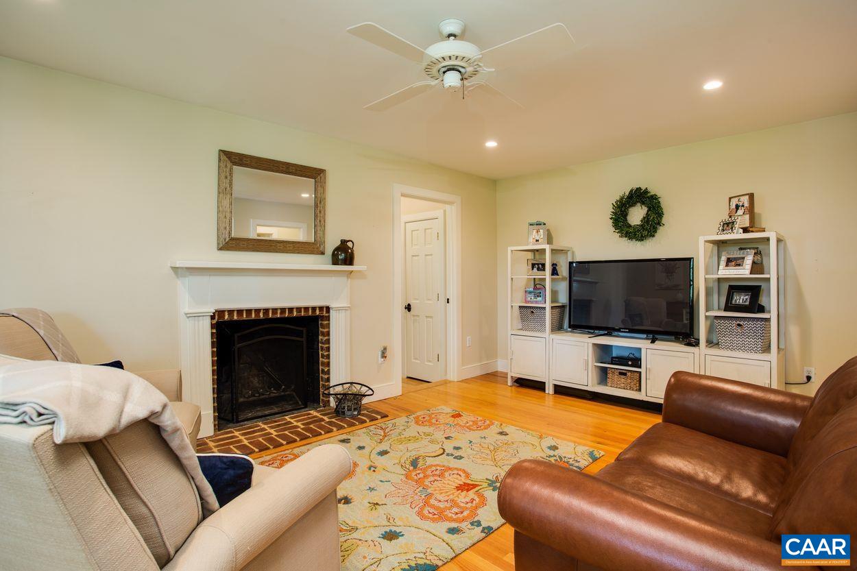 3923 Free Union Road Charlottesville, VA 22901 - Photo 24 of 52 a living room with furniture and a flat screen tv