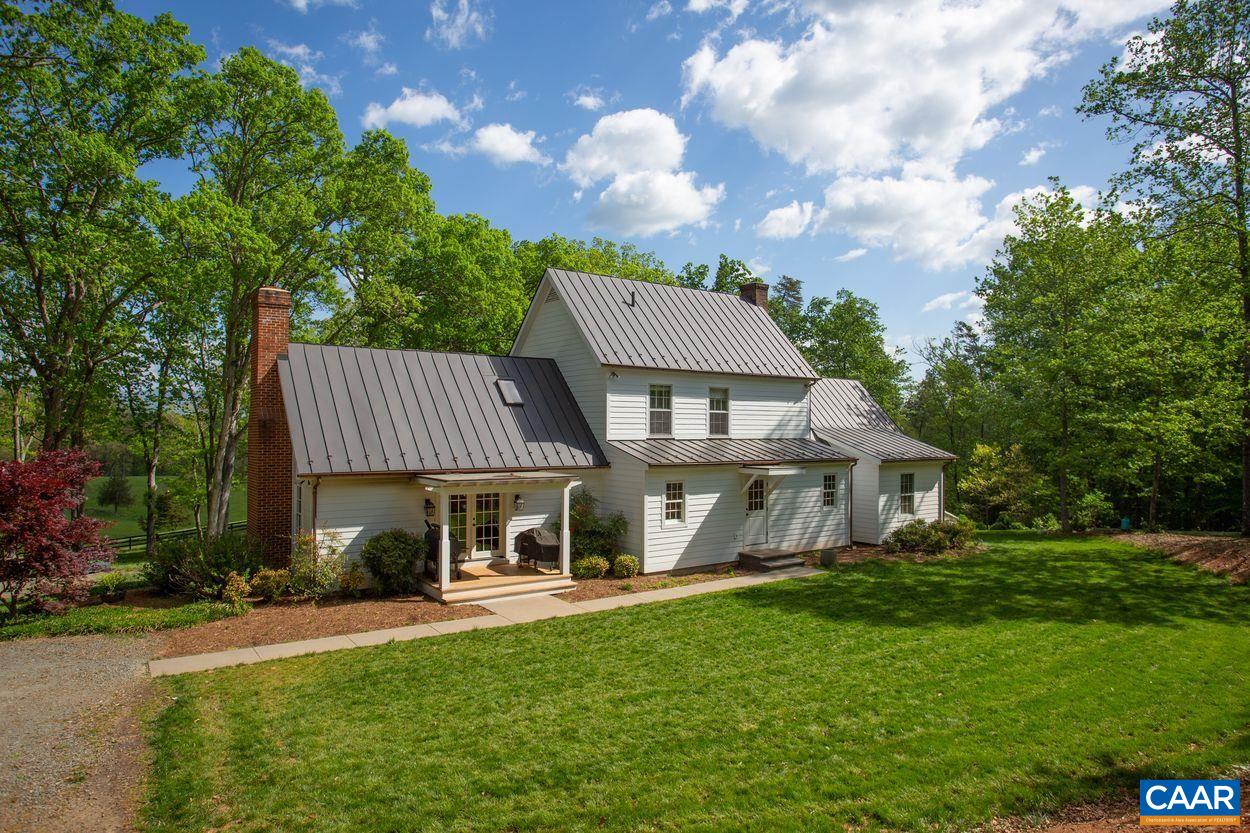 3923 Free Union Road Charlottesville, VA 22901 - Photo 5 of 52 a front view of a house with garden