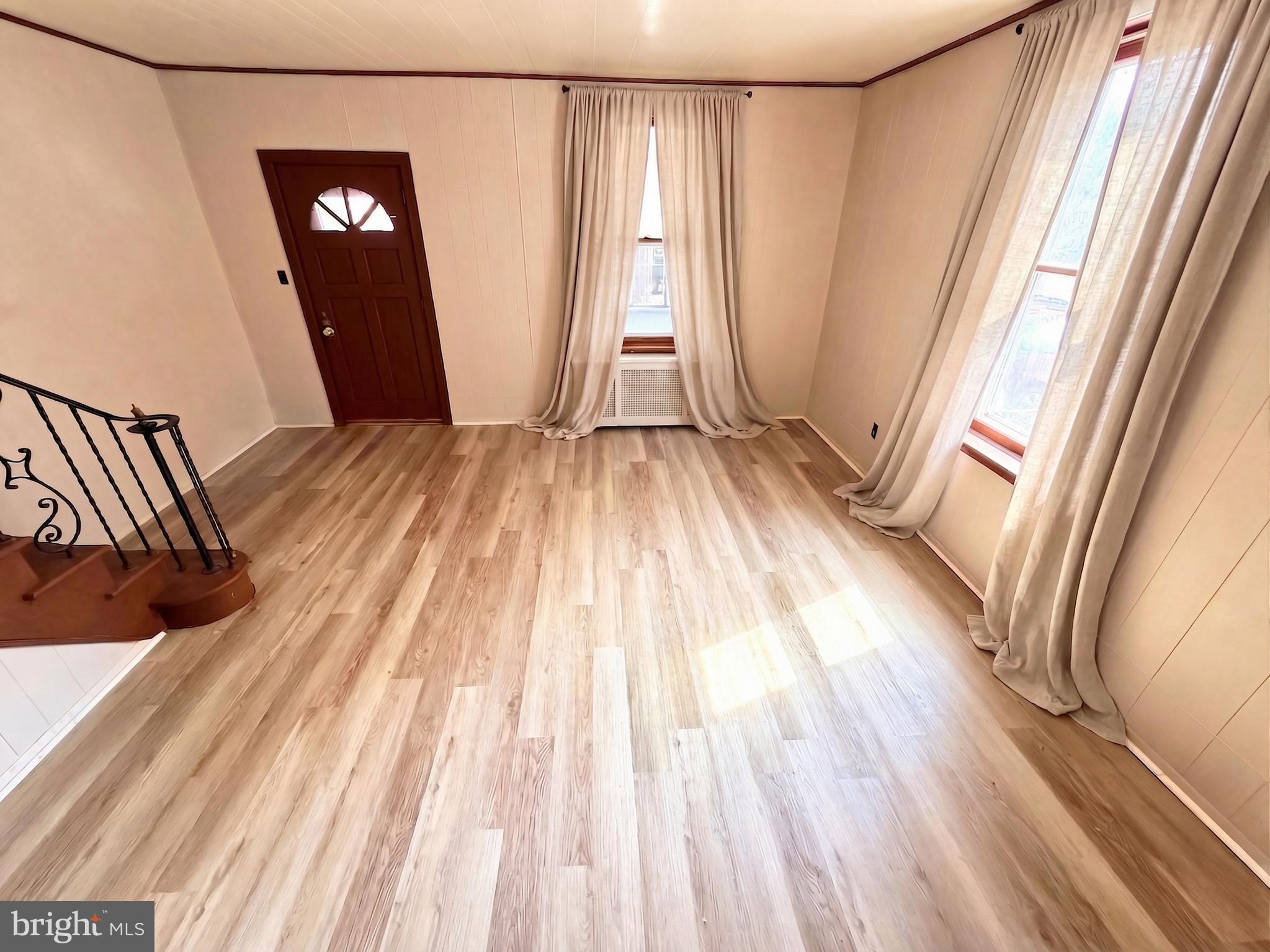 19 4th Avenue Roebling, NJ 08554 - Photo 4 of 20 a view of a room with wooden floor and window