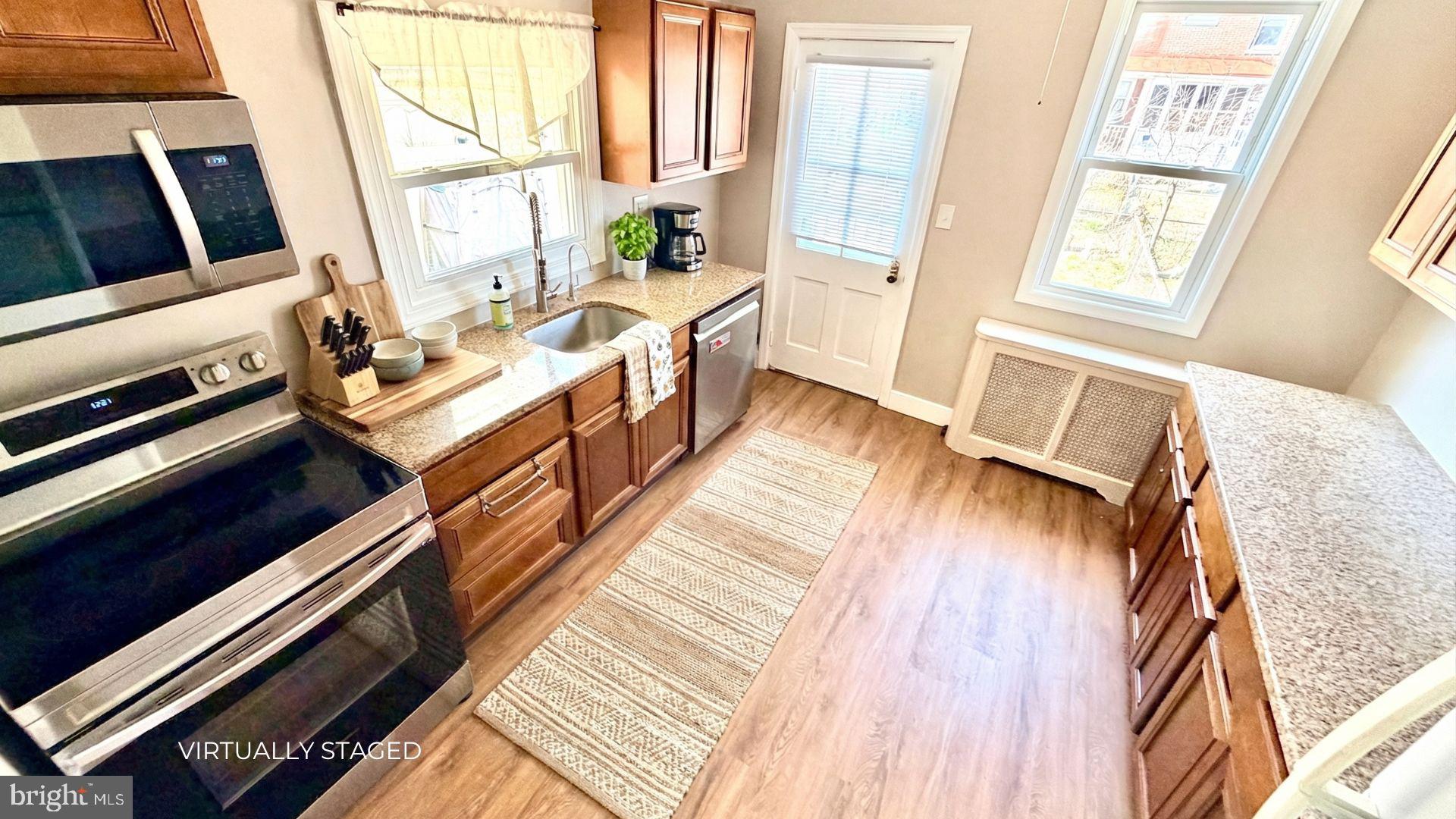 19 4th Avenue Roebling, NJ 08554 - Photo 8 of 20 a living room with stainless steel appliances furniture a large window
