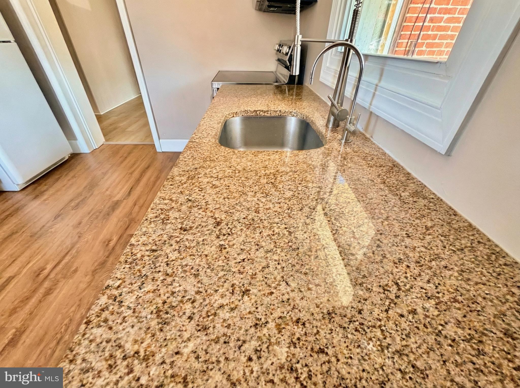 19 4th Avenue Roebling, NJ 08554 - Photo 10 of 20 a view of a kitchen with a sink and cabinets