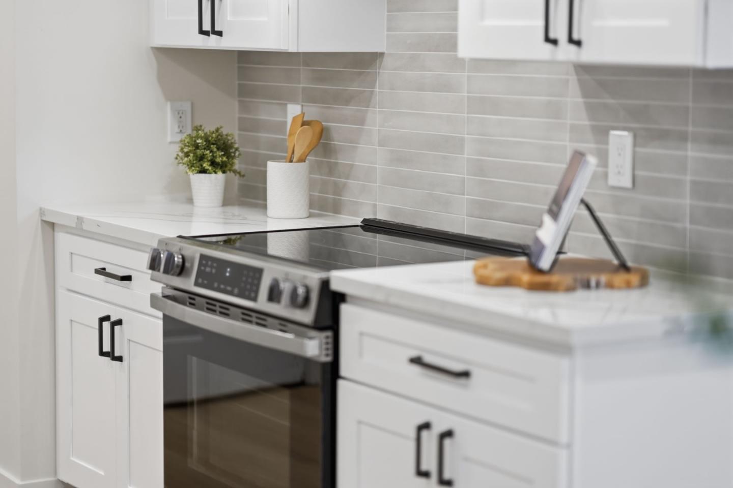 409 Puerto Place Hayward, CA 94541 - Photo 23 of 54 a close view of a stove top oven sitting inside of a kitchen