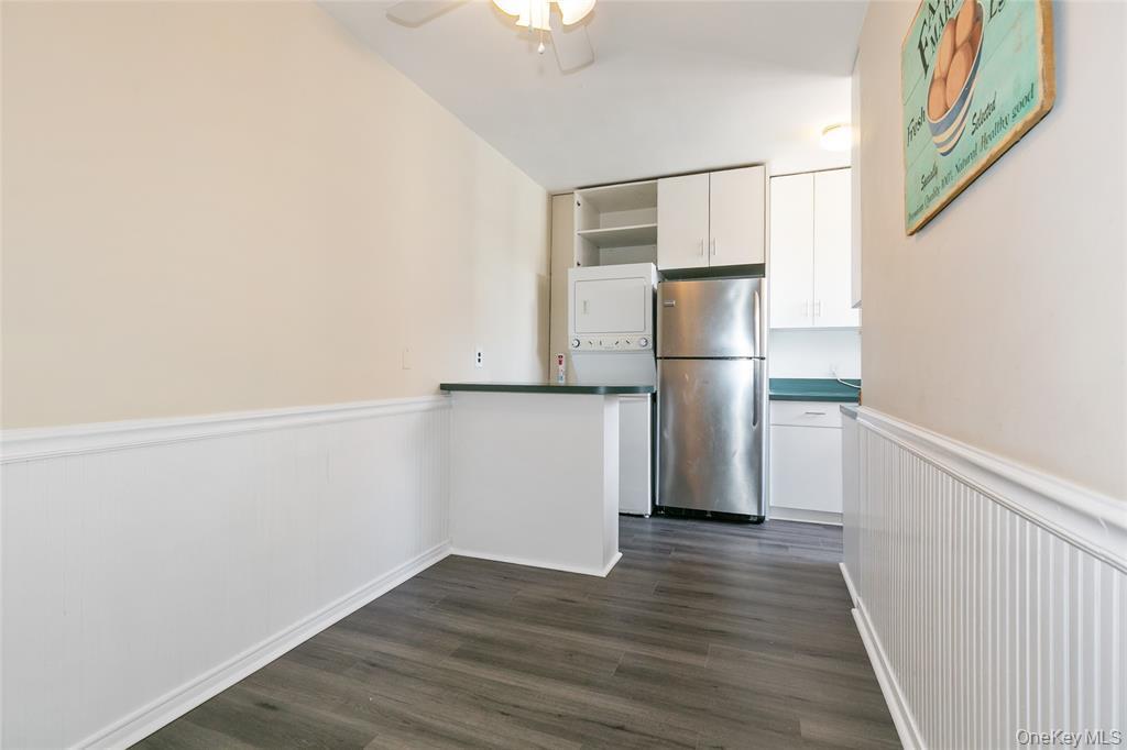 2 Town House Place, Unit 3N Great Neck, NY 11021 - Photo 16 of 26 a view of a kitchen with wooden floor