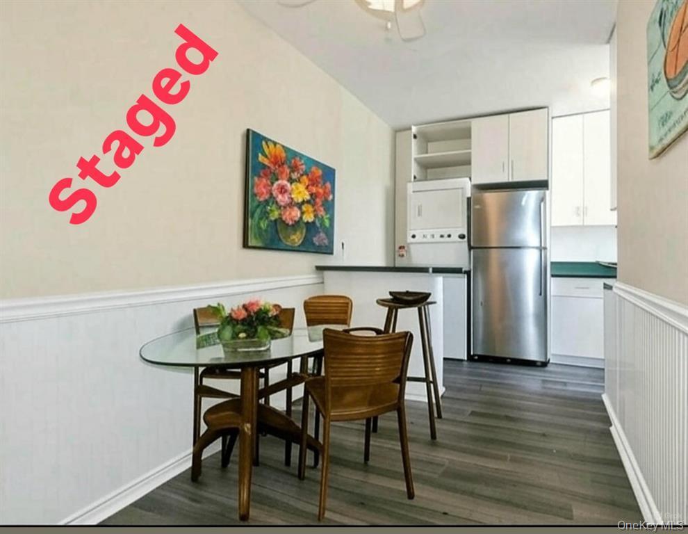 2 Town House Place, Unit 3N Great Neck, NY 11021 - Photo 17 of 26 a view of a room with furniture and wooden floor