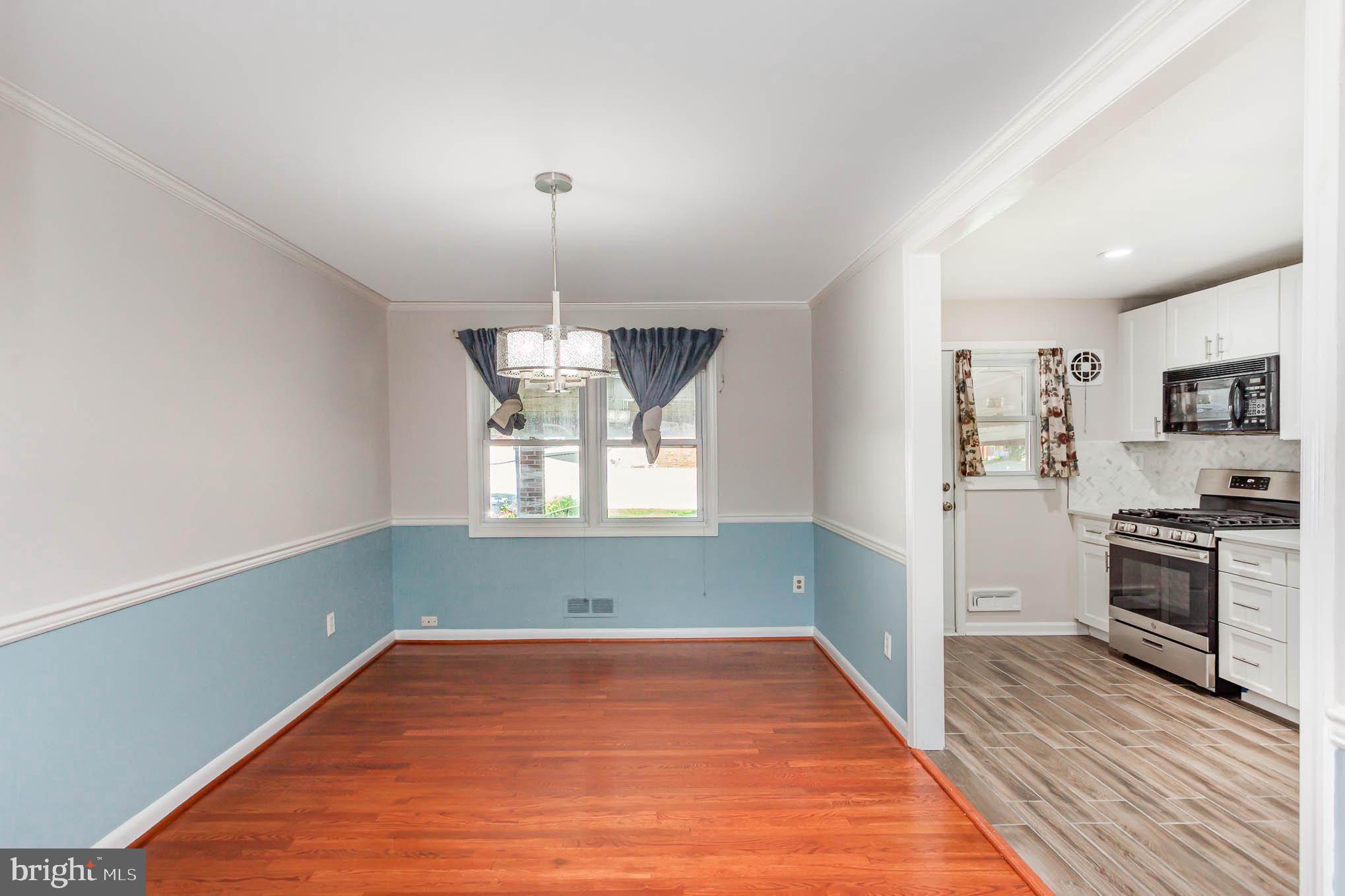1776 Stokesley Road Dundalk, MD 21222 - Photo 5 of 24 Dining room open to updated kitchen