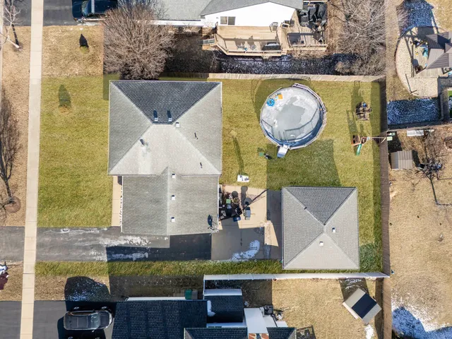 an aerial view of a swimming pool