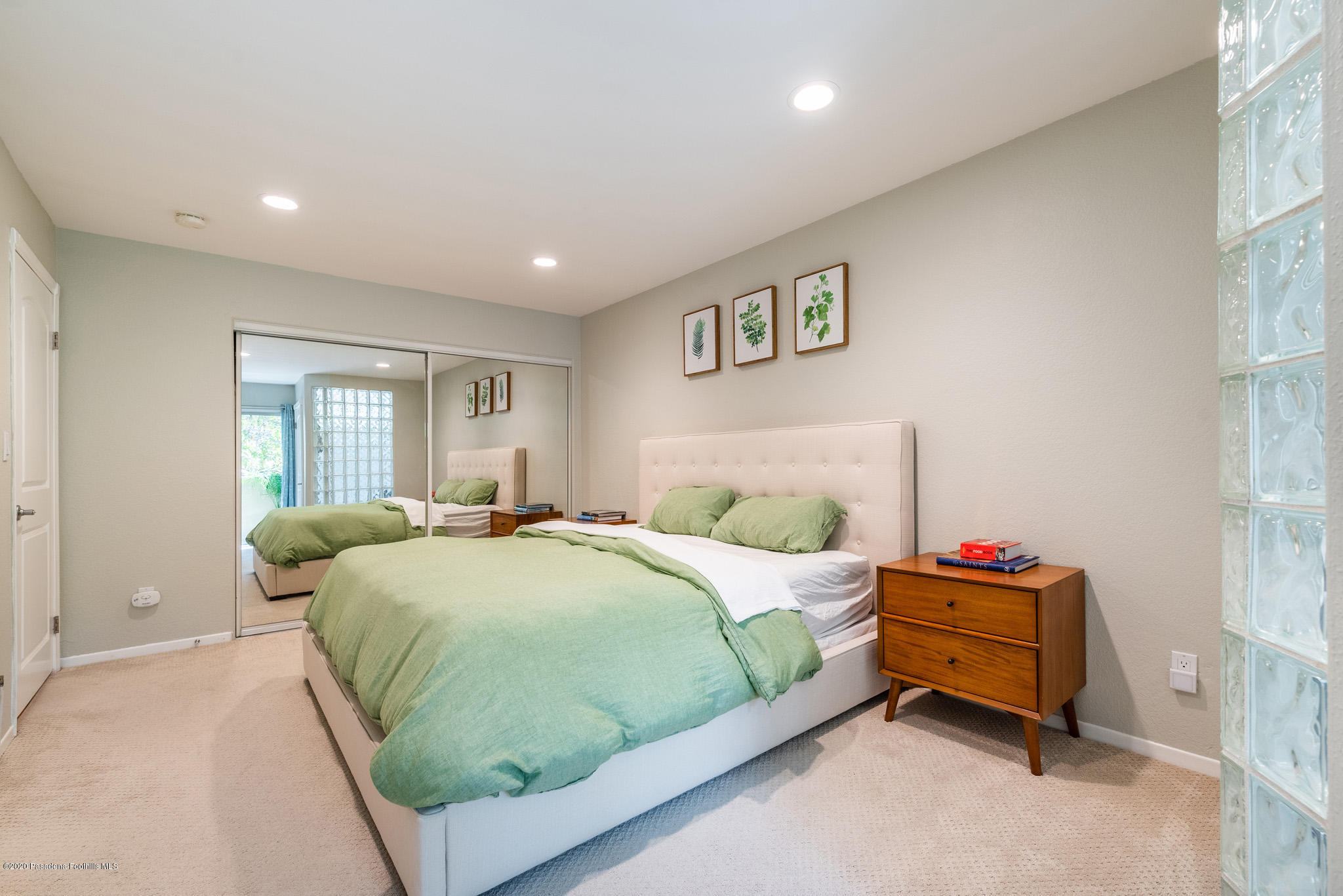 6140 Monterey Road, Unit 328 Los Angeles, CA 90042 - Photo 13 of 28 a bedroom with a bed and dresser
